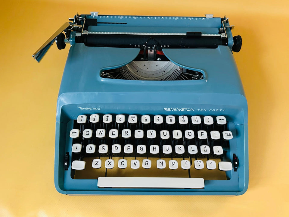 Mint condition Remington Ten Forty portable typewriter in sky blue