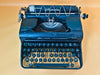 Rare Olympia Progress typewriter featuring Horler London retailer marking