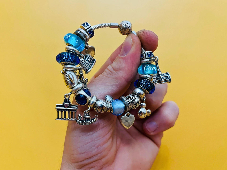 Authentic Pandora Silver Bracelet with 24 Charms - Original Box & Documents Included