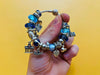 Authentic Pandora Silver Bracelet with 24 Charms - Original Box & Documents Included