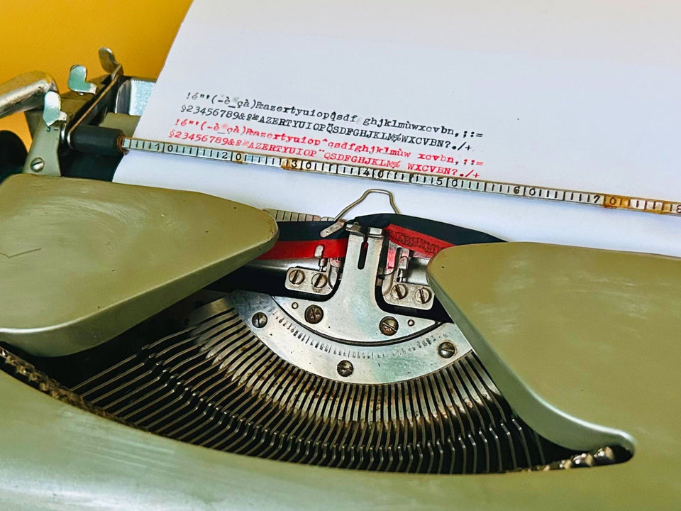 Typing sample produced by the Erika 10 demonstrating crisp black and red text with excellent print quality.