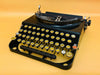 Remington Portable vintage typewriter with glass keys and French AZERTY keyboard