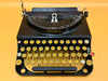 Top view of Remington Portable typewriter showing glass keys and carriage