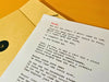Kraft envelope with string closure for custom typewriter poem