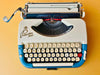 Working typewriter Princess 300 blue top-down keyboard view