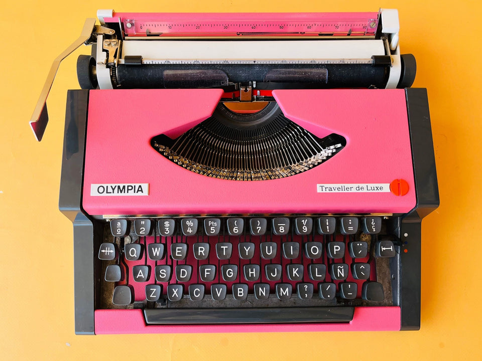 Pink Olympia Traveller De Luxe top-down view showing keyboard