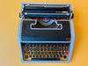 Working typewriter Olivetti Underwood Lettera 33 with case