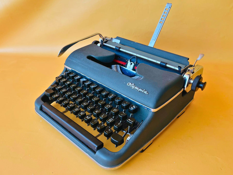 Working typewriter Olympia SM3 teal front view