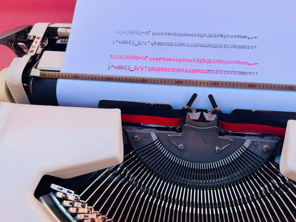 Brother Deluxe 900 typesample in black and red ink