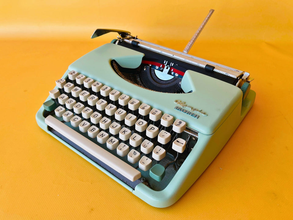 Working typewriter Olympia Splendid 33 custom painted cyan main view