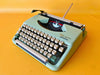 Working typewriter Olympia Splendid 33 custom painted cyan main view