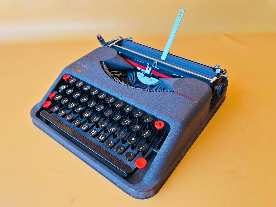 Working typewriter Hermes Baby metal main view with case