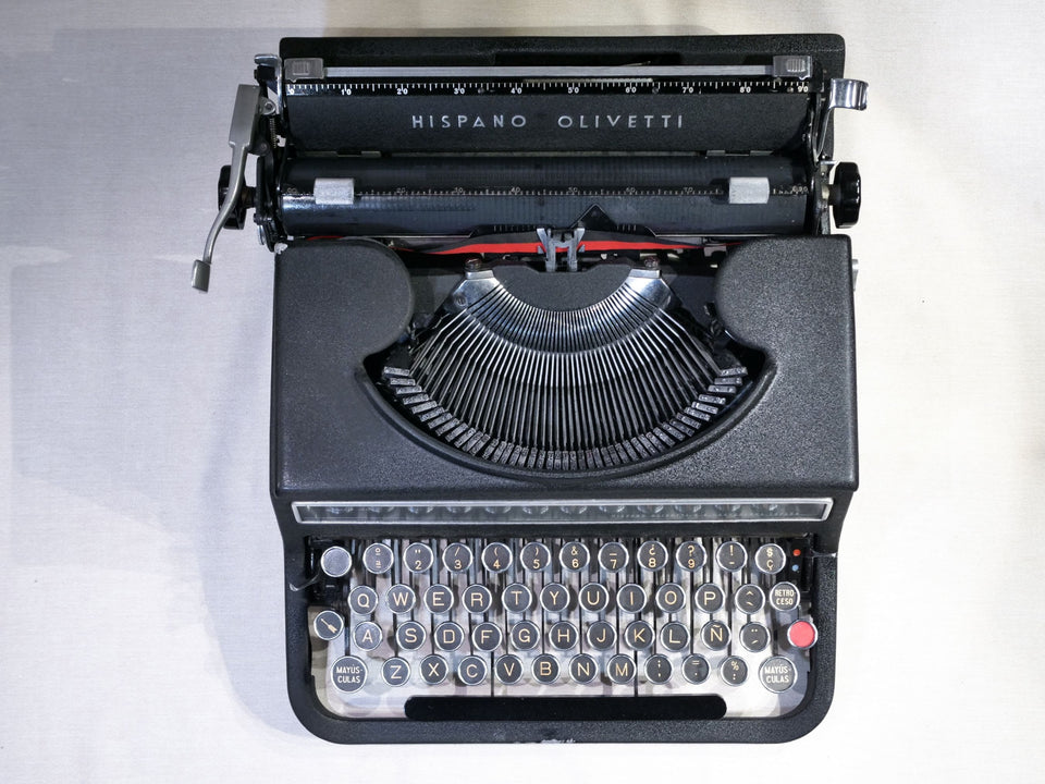 Hispano Olivetti Studio 46 keyboard detail keys close-up black metal machine