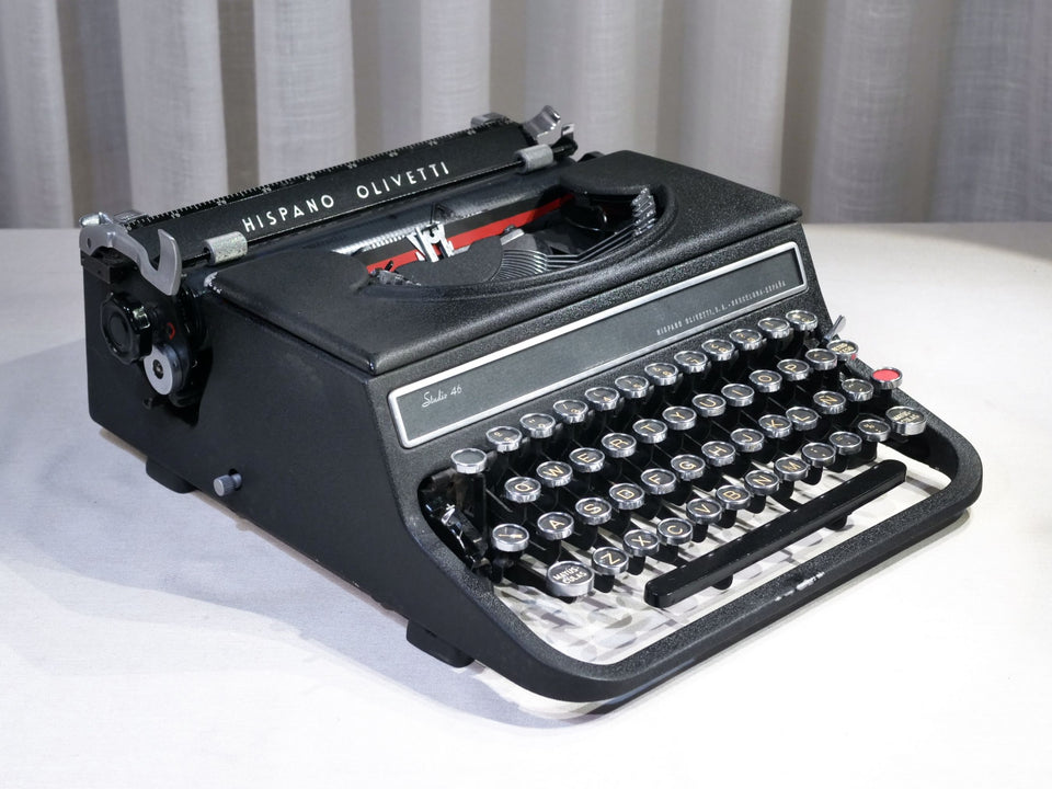 Hispano Olivetti Studio 46 black metal typewriter 1950s vintage manual
