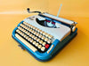 Working typewriter Princess 300 blue and beige main view with case
