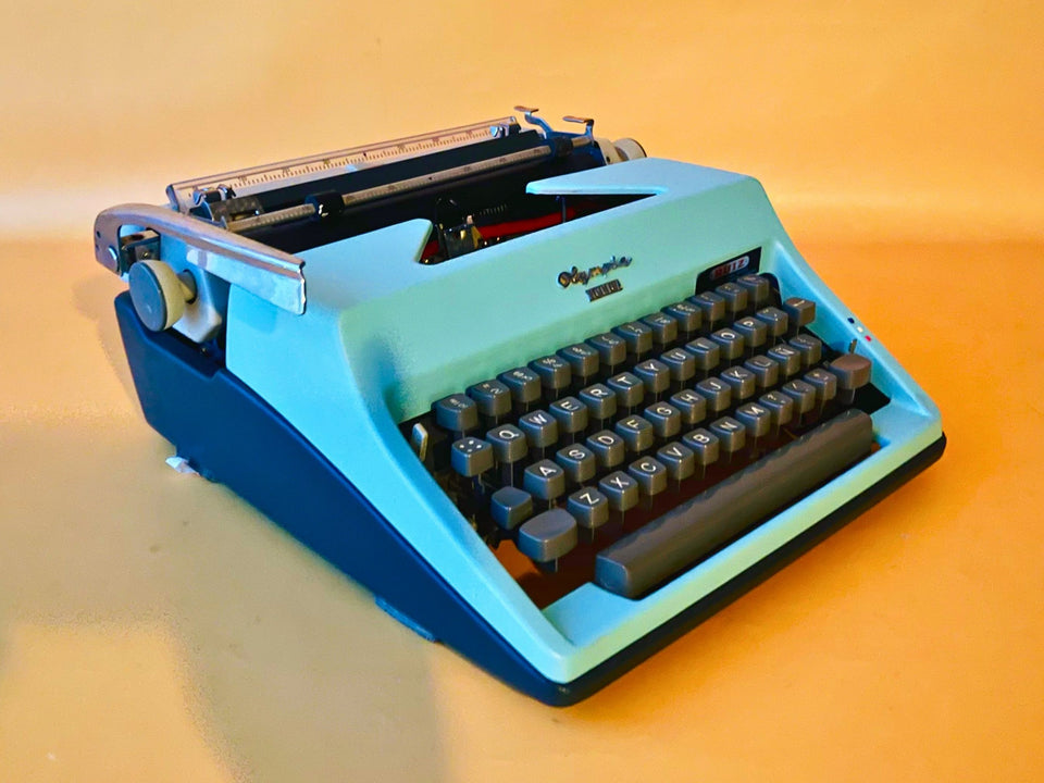 Olympia Monica | 1969 West German Icon | SM8 Working Typewriter Custom Cyan With Case