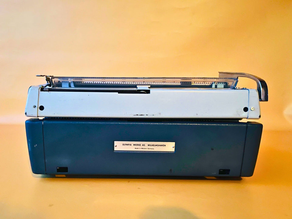 Olympia Monica | 1969 West German Icon | SM8 Working Typewriter Custom Cyan With Case