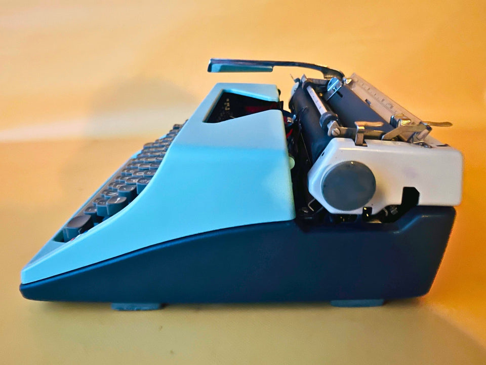 Olympia Monica | 1969 West German Icon | SM8 Working Typewriter Custom Cyan With Case
