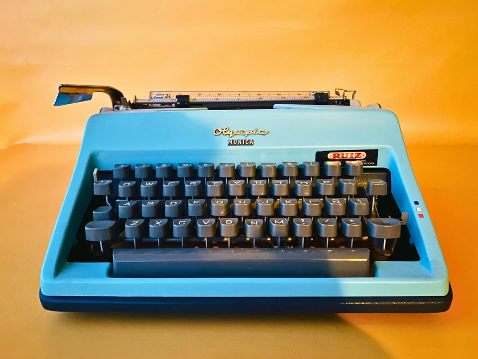 Olympia Monica | 1969 West German Icon | SM8 Working Typewriter Custom Cyan With Case
