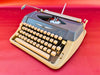 Working typewriter Amaya Deluxe blue and beige main view with case