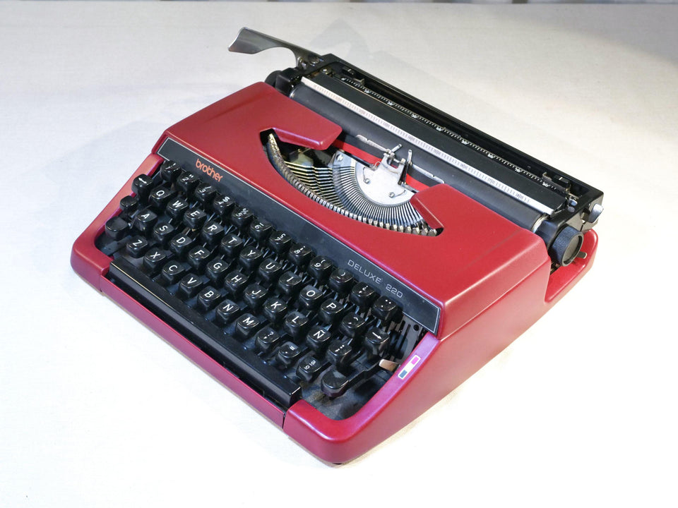 Brother deluxe 220 red typewriter