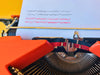 Hermes Baby typesample sheet typed in black and red