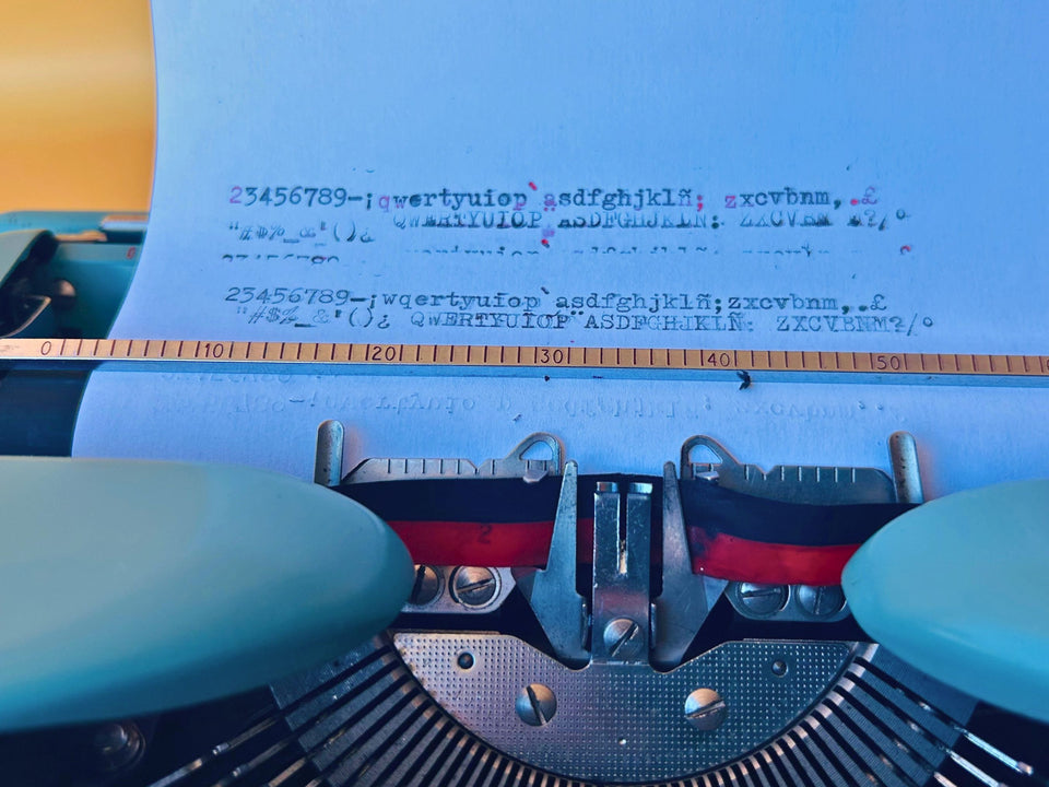 Singer T4 typesample sheet typed in black and red