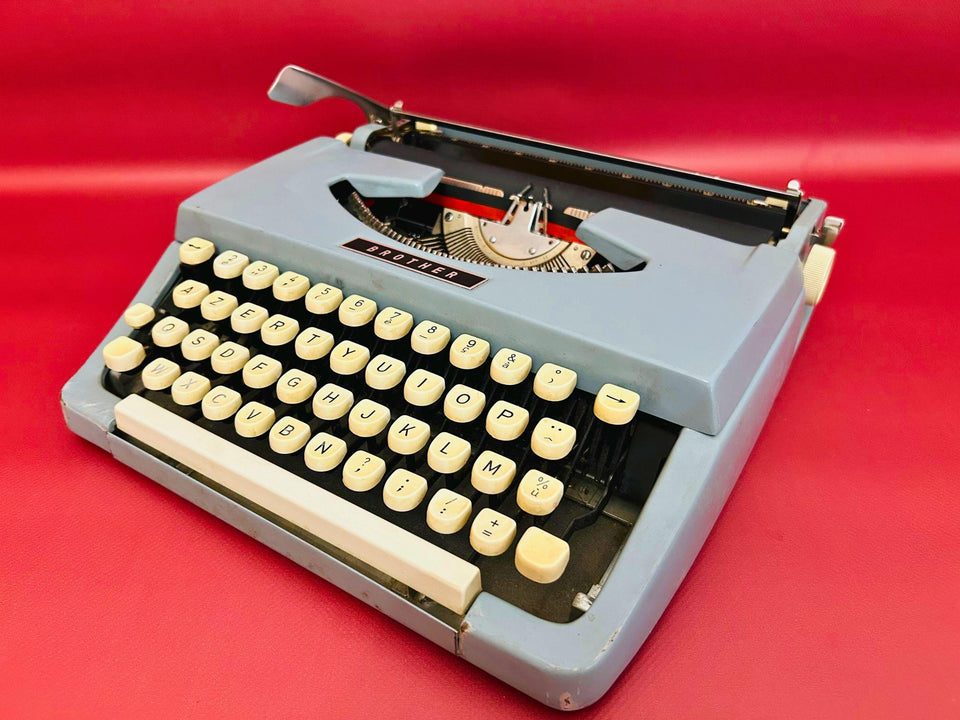 Brother blue metal typewriter