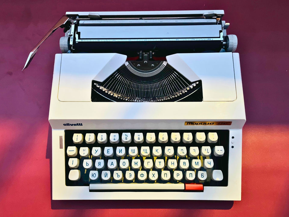 Maritsa Lux typewriter angled view showing Cyrillic keys and orange tab key