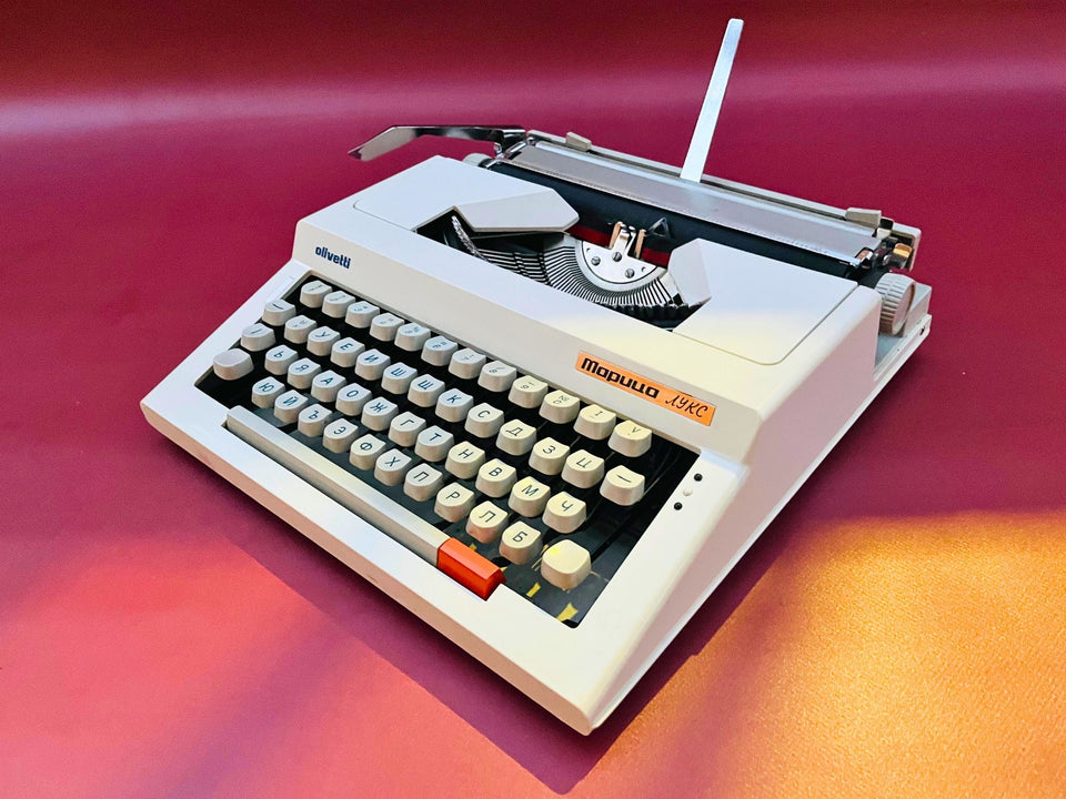 White Maritsa Lux typewriter with Cyrillic keyboard and Olivetti badge