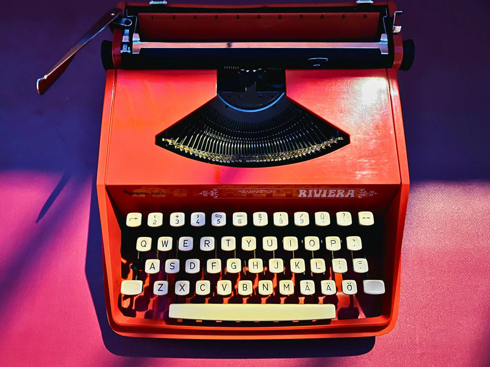 Close-up of Å Ä Ö keys on an orange Remington Riviera by Sperry Rand