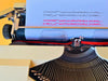 Close-up of Dutch QWERTY keys with ij and red TAB key on a Torpedo typewriter