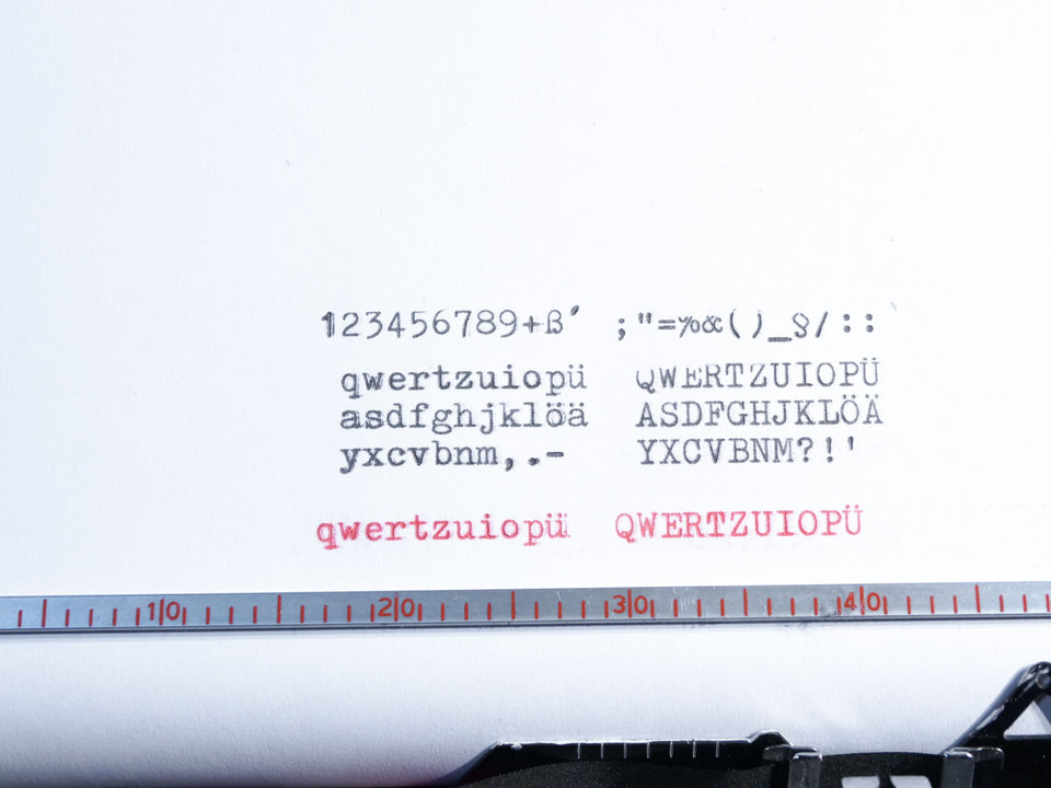 Typing sample from Safari 2 manual typewriter QWERTZ black ink text