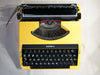 Safari 2 typewriter keyboard detail QWERTZ keys close-up yellow machine