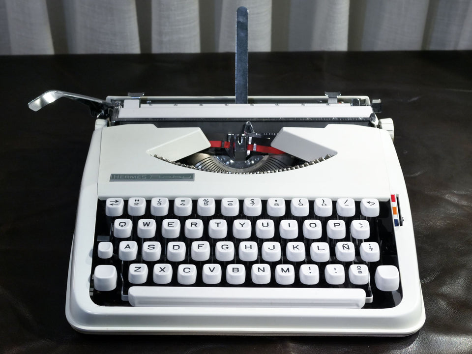 Hermes Baby | Arctic White | Swiss-Made Ultra-Portable Icon (1970s)