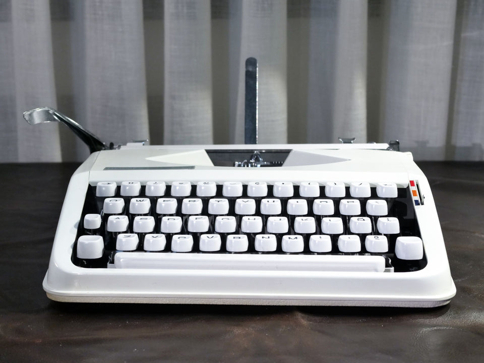 Hermes Baby | Arctic White | Swiss-Made Ultra-Portable Icon (1970s)