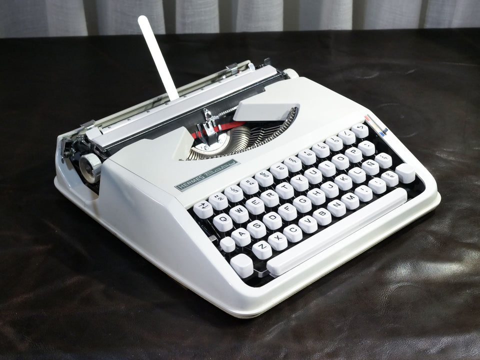 Hermes Baby | Arctic White | Swiss-Made Ultra-Portable Icon (1970s)