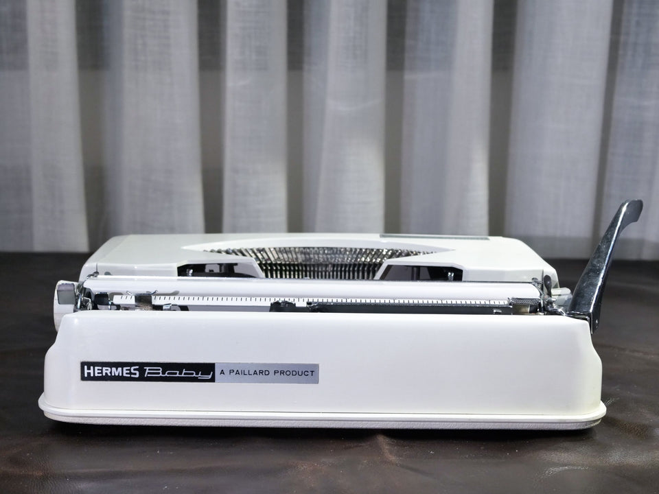 Hermes Baby | Arctic White | Swiss-Made Ultra-Portable Icon (1970s)