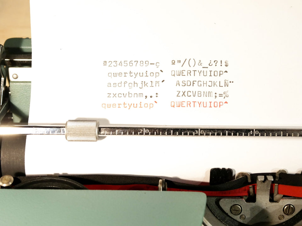 Crisp black and red ink type sample on white paper produced by this vintage Italian-designed Olivetti Lettera 32.