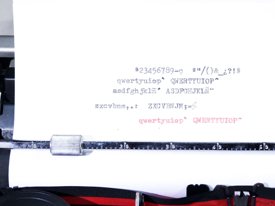 Crisp black and red ink type sample produced by this professionally revised Olivetti Lettera DL manual typewriter