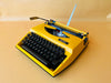 Royal Sahara Portable Typewriter Yellow  – Spanish QWERTY – With Case – Serviced & Working
