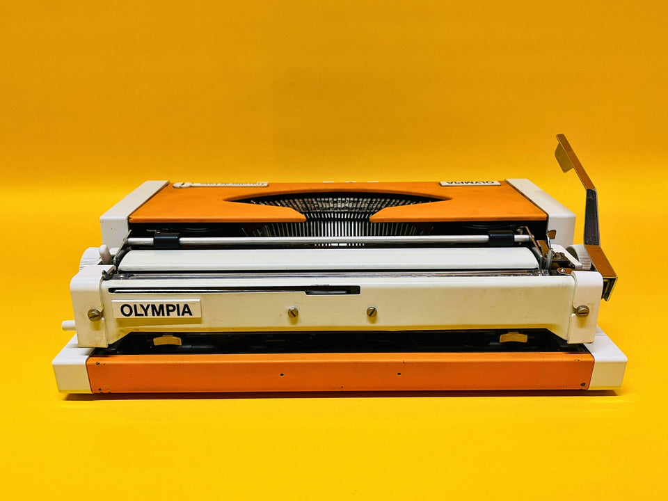 Olympia Traveller De Luxe Typewriter – 1970 Orange Portable Manual Typewriter with Case
