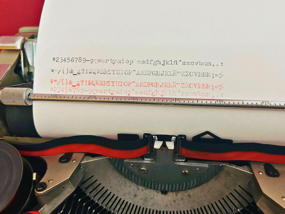 Olivetti Studio 44 typing sample typeface gray typewriter