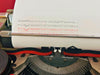 Olivetti Studio 44 typing sample typeface gray typewriter