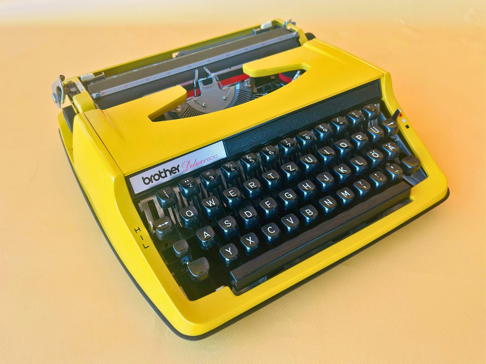 Brother Deluxe 800 Portable Typewriter - Working 1970s Yellow - QWERTZ with Case