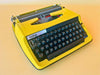 Brother Deluxe 800 Portable Typewriter - Working 1970s Yellow - QWERTZ with Case