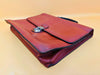 Arthur & Aston briefcase detail brown leather texture and stitching close-up