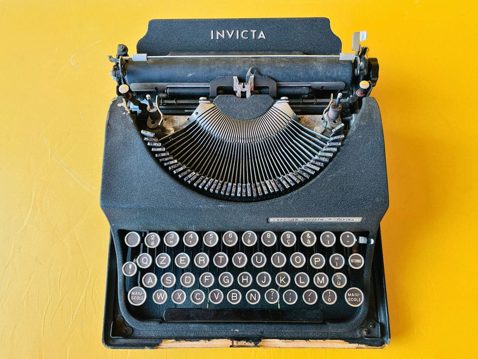 Invicta keyboard detail black manual typewriter keys close-up