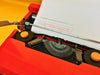 Olivetti Valentine typing sample QZERTY typeface red design typewriter