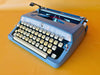 Brother Deluxe blue portable typewriter AZERTY
